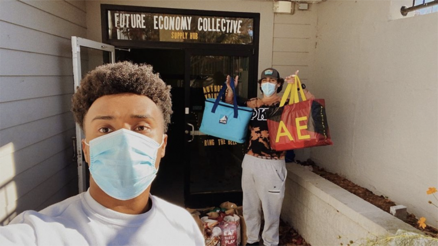 Musse Yimer and fellow Virginia Zeta brother deliver meals to a local food bank